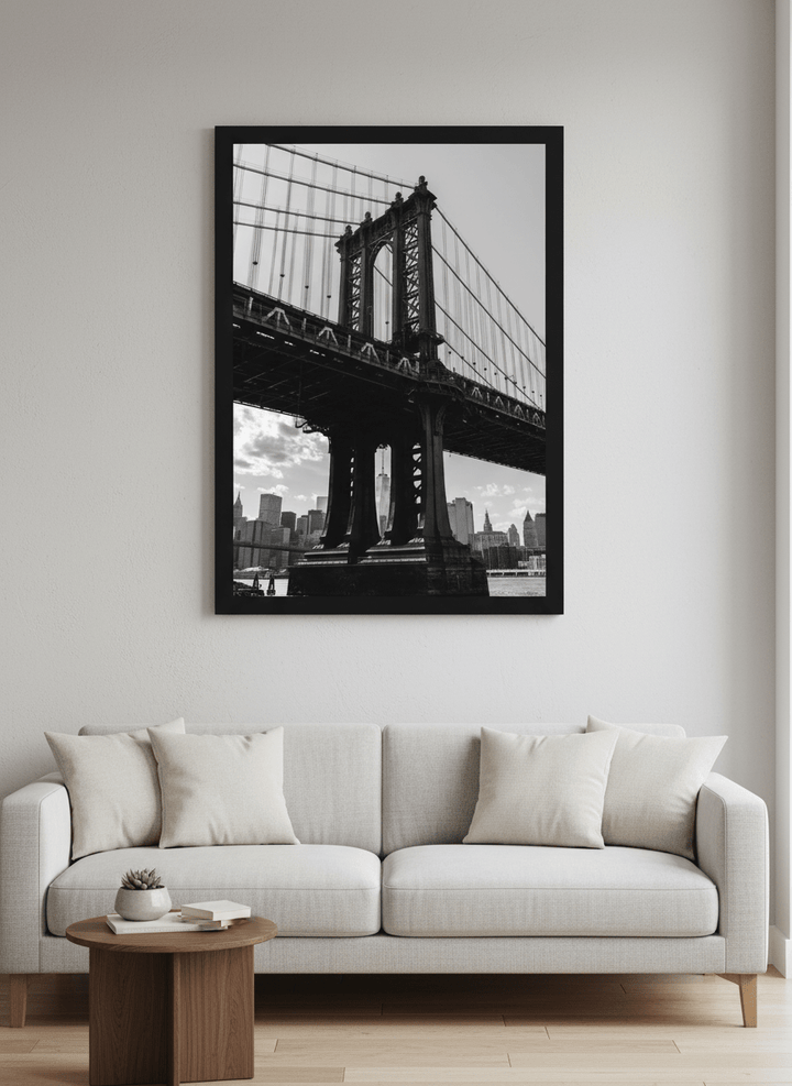 Modern wall art styled above a sofa in a neutral living room