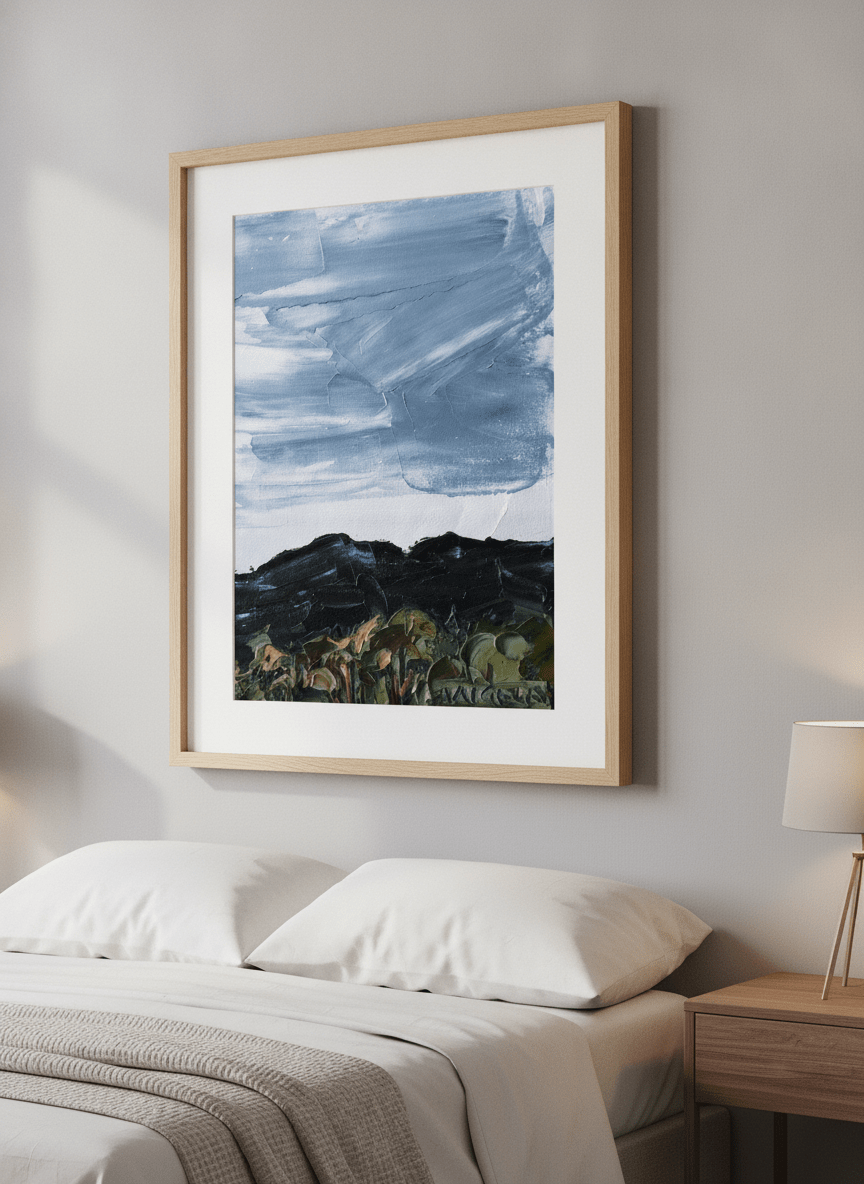Minimalist artwork displayed in a calm, light-filled bedroom interior