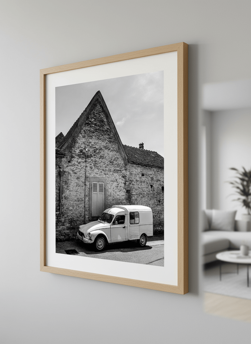 Modern wall art styled above a sofa in a neutral living room
