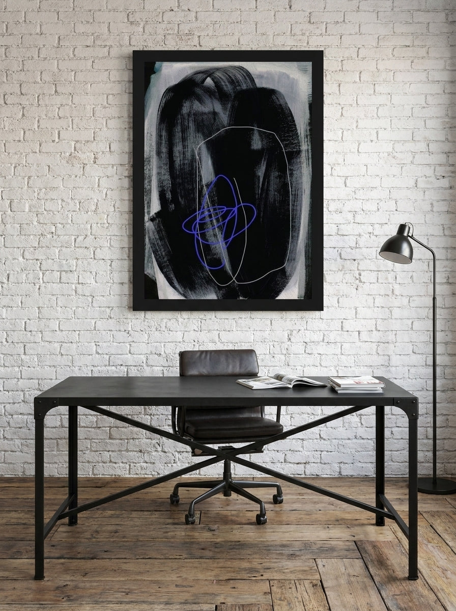 Modern wall art print styled on the wall in an industrial loft home office
