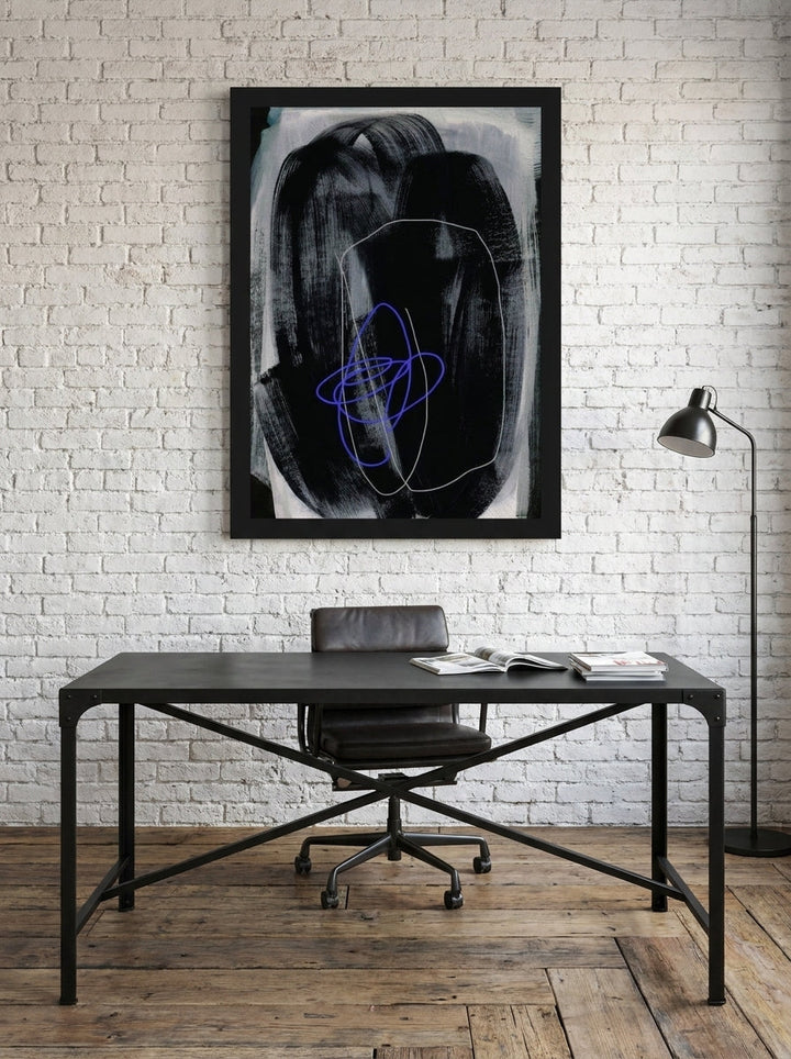 Modern wall art print styled on the wall in an industrial loft home office