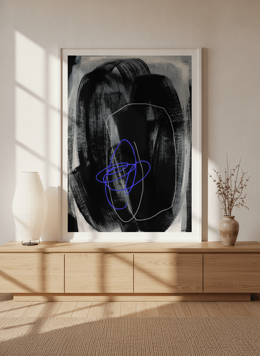 Modern wall art print standing on a sideboard in a warm Japandi home office