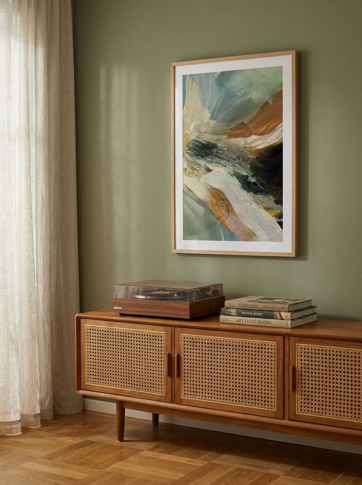 Modern wall art print styled on the wall in a mid-century living room