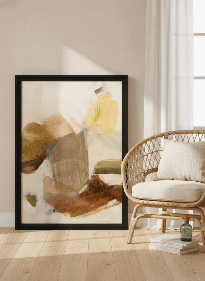 Modern wall art print leaning against the wall in a coastal living room