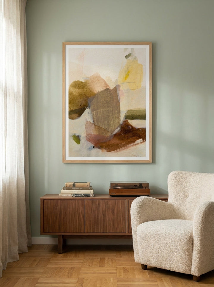 Modern wall art print styled on the wall in a mid-century living room