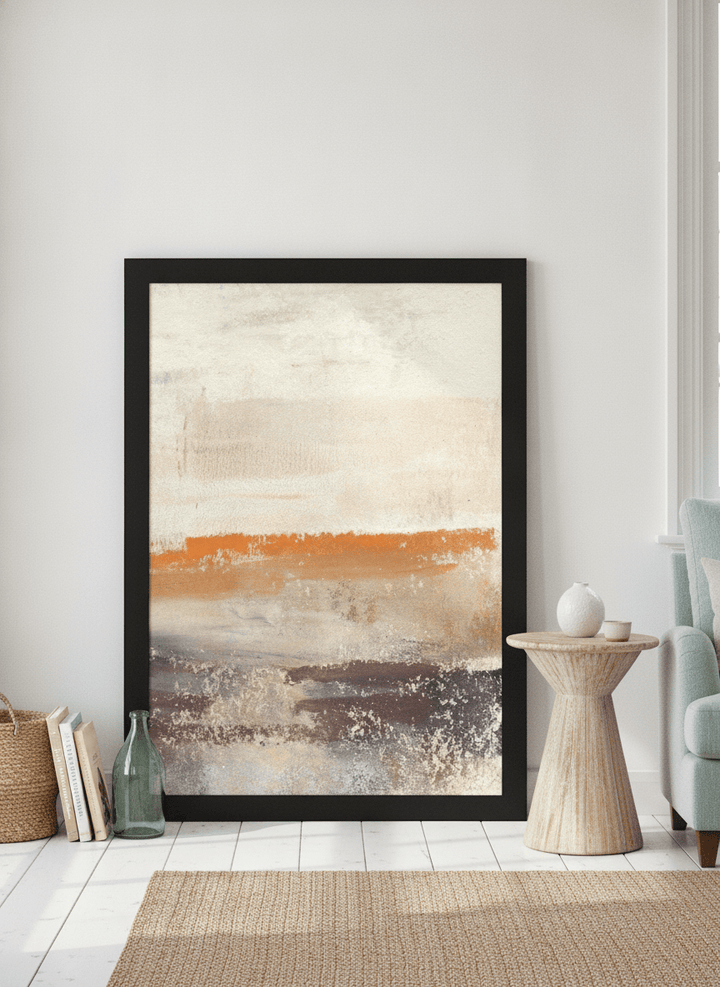 Modern wall art print leaning against the wall in a coastal living room