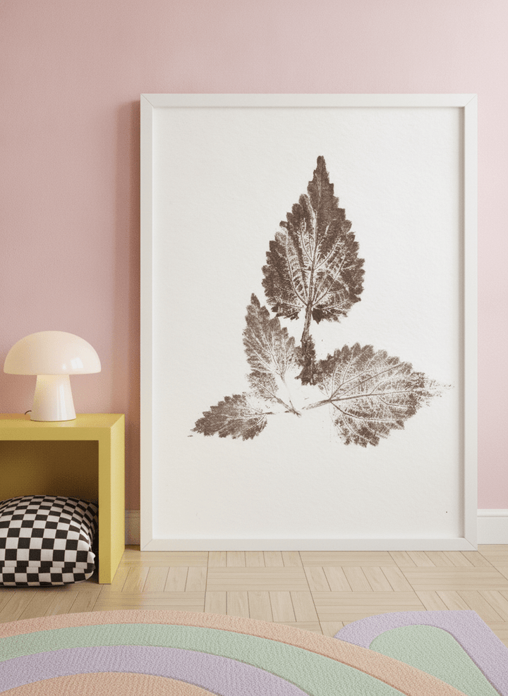Modern wall art print standing on a side table in a colourful eclectic bedroom