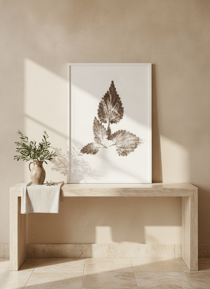 Modern wall art print standing on a console in a Mediterranean home office