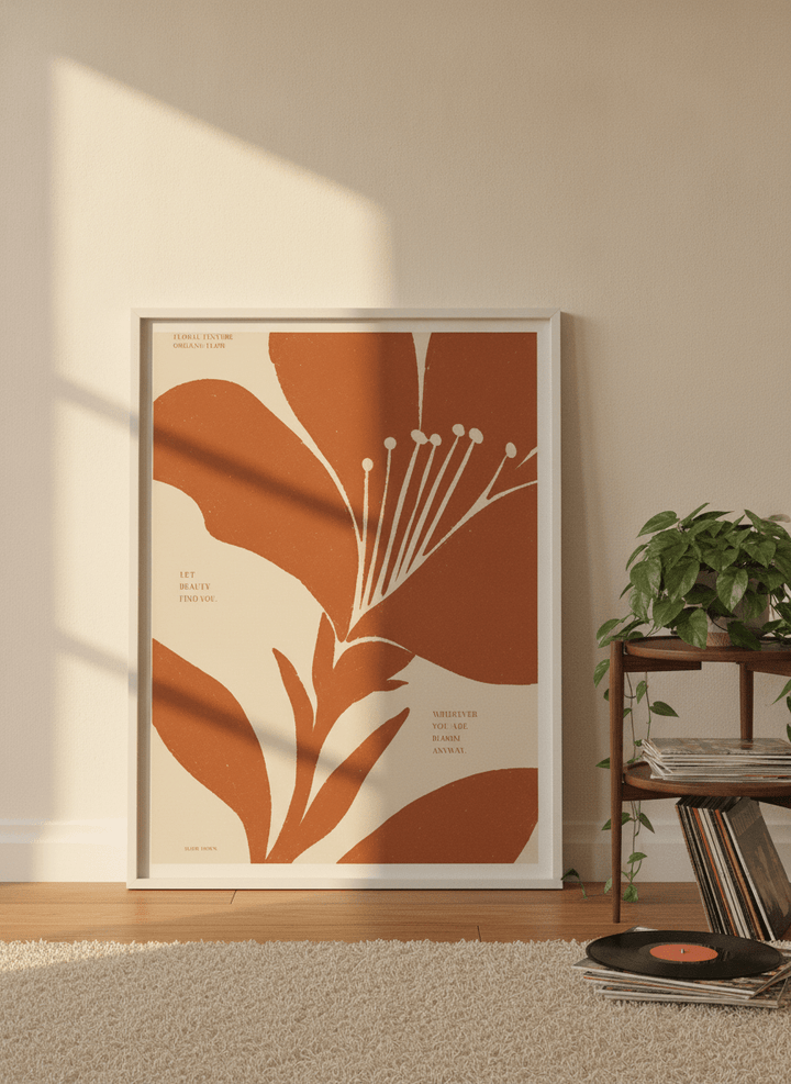Modern wall art print leaning against the wall in a retro 70s home office