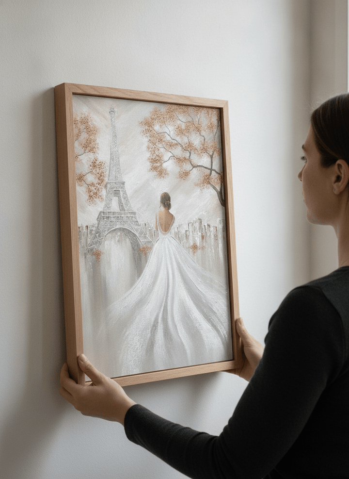 Person showcasing the artwork against a clean modern interior wall