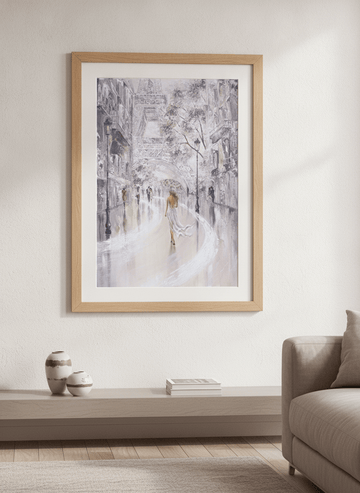 Modern wall art styled above a sofa in a neutral living room