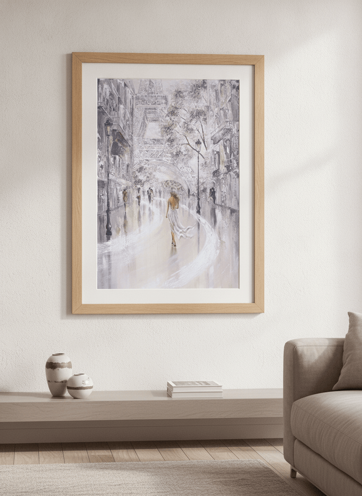 Modern wall art styled above a sofa in a neutral living room