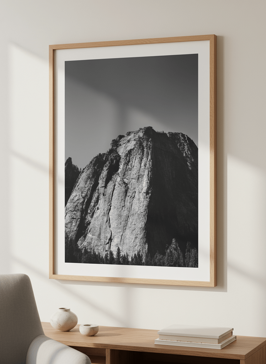 Modern wall art styled above a sofa in a neutral living room