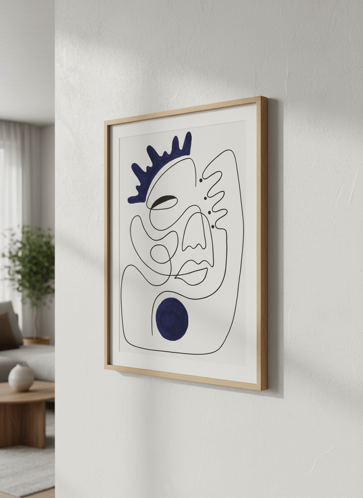 Modern wall art styled above a sofa in a neutral living room
