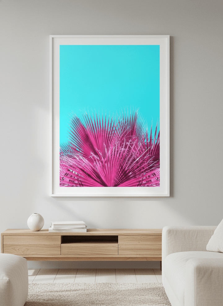 Modern wall art styled above a sofa in a neutral living room