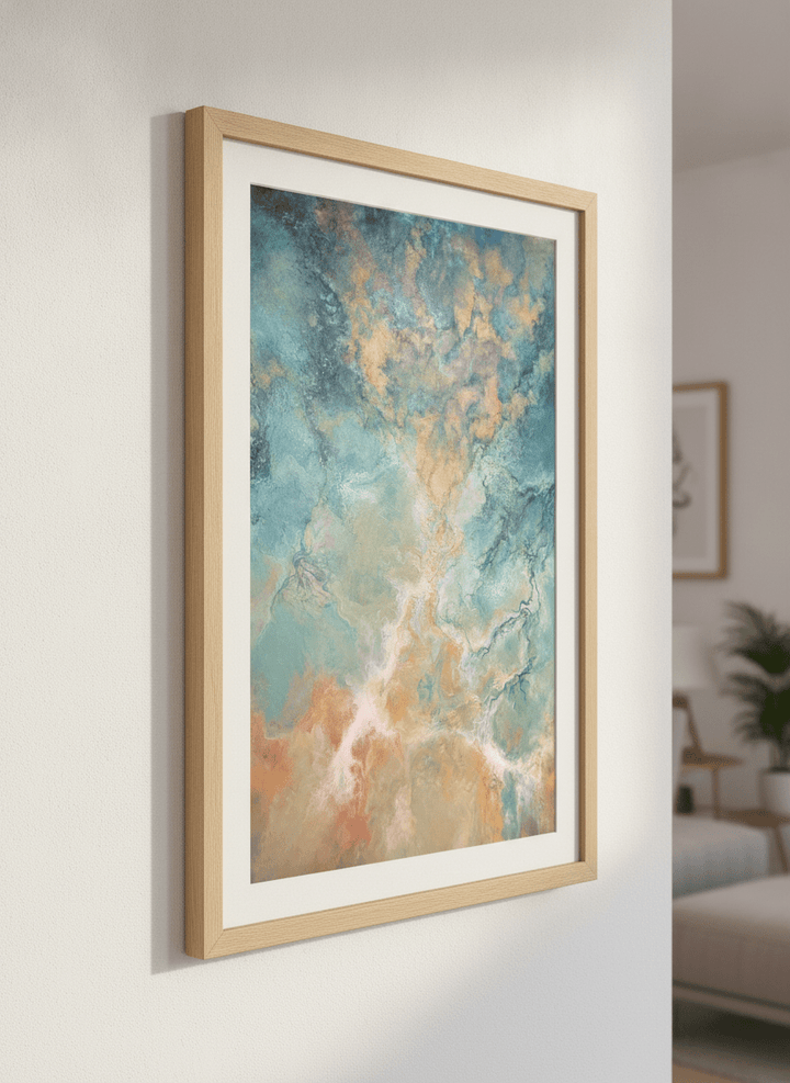 Modern wall art styled above a sofa in a neutral living room