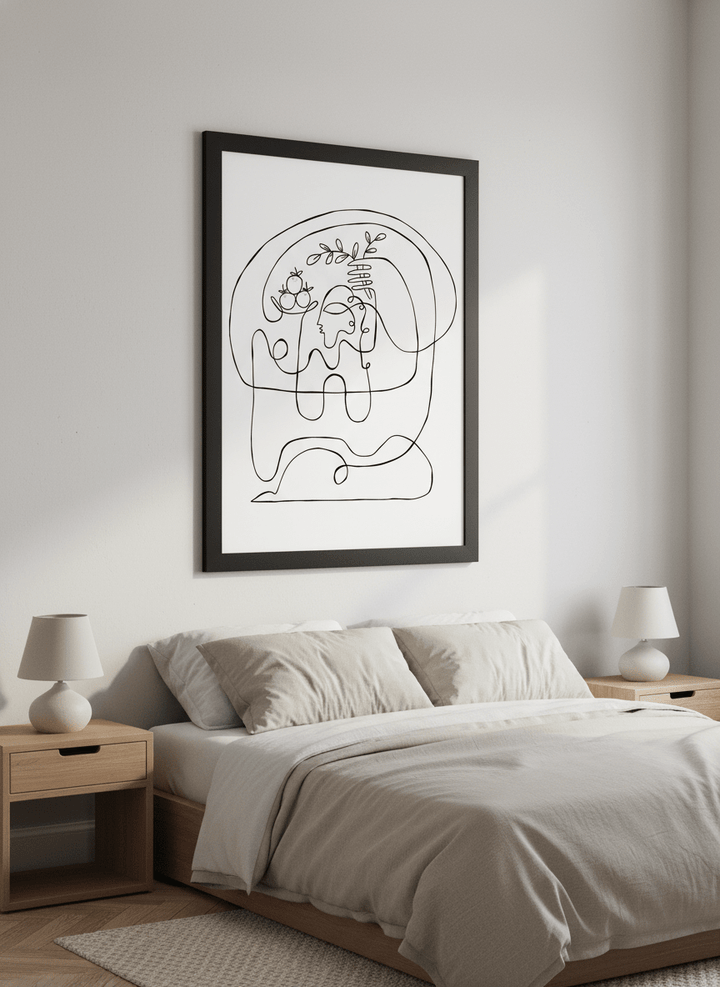 Minimalist artwork displayed in a calm, light-filled bedroom interior