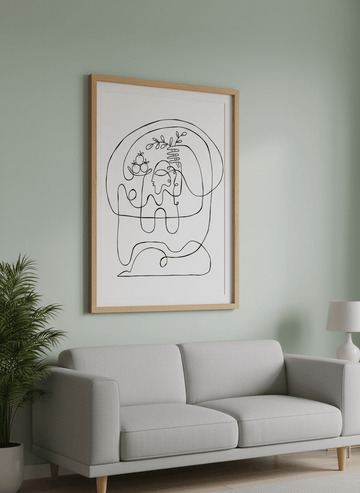 Modern wall art styled above a sofa in a neutral living room
