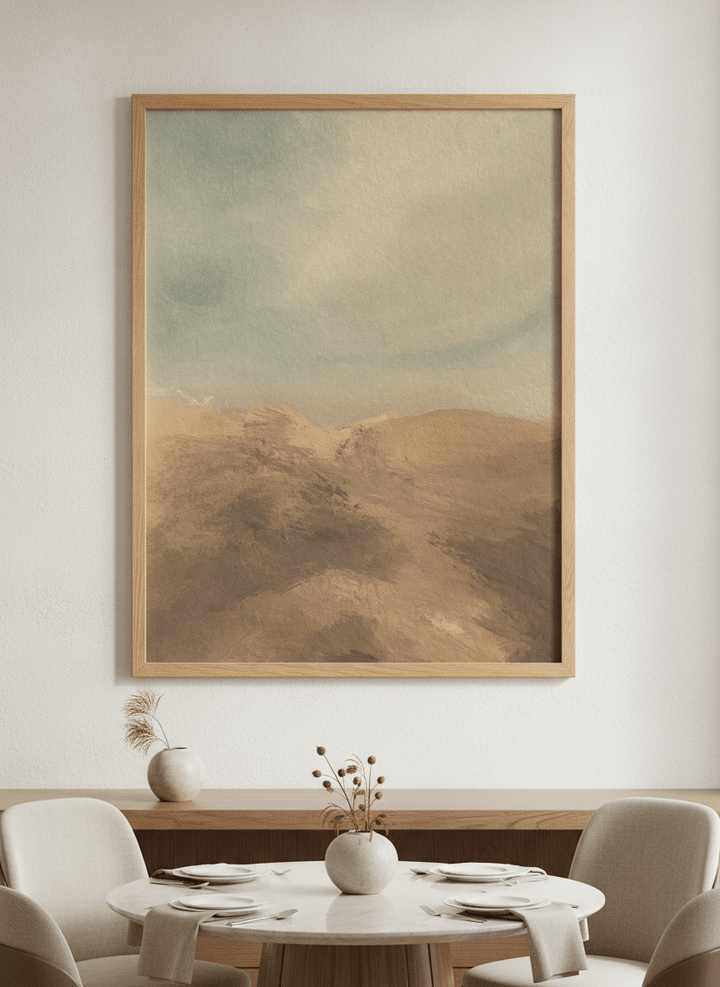 Wall art styled above a dining table in a contemporary home