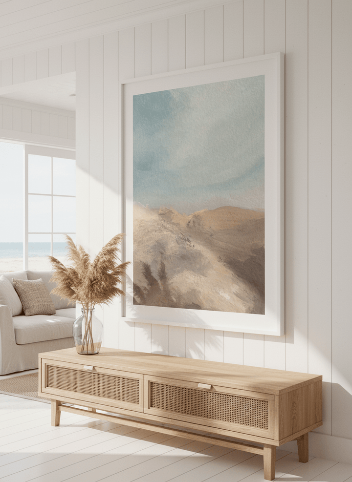 Neutral wall art displayed in a sunny coastal beach house