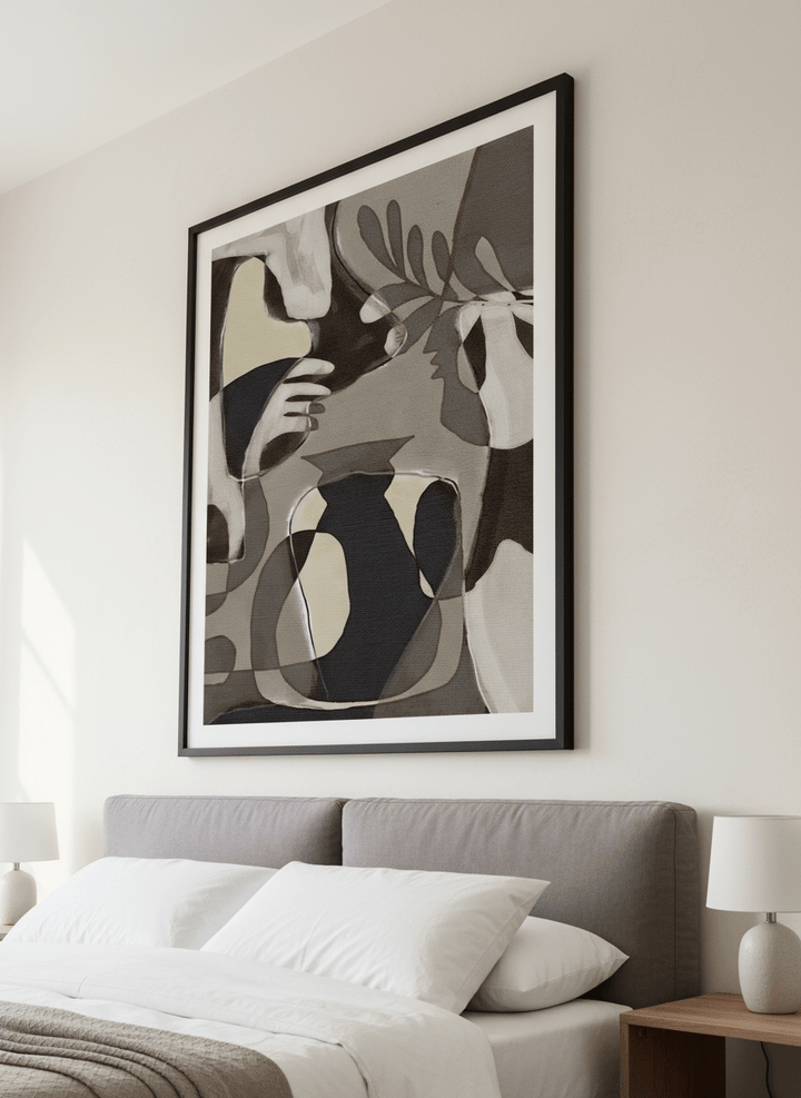 Minimalist artwork displayed in a calm, light-filled bedroom interior