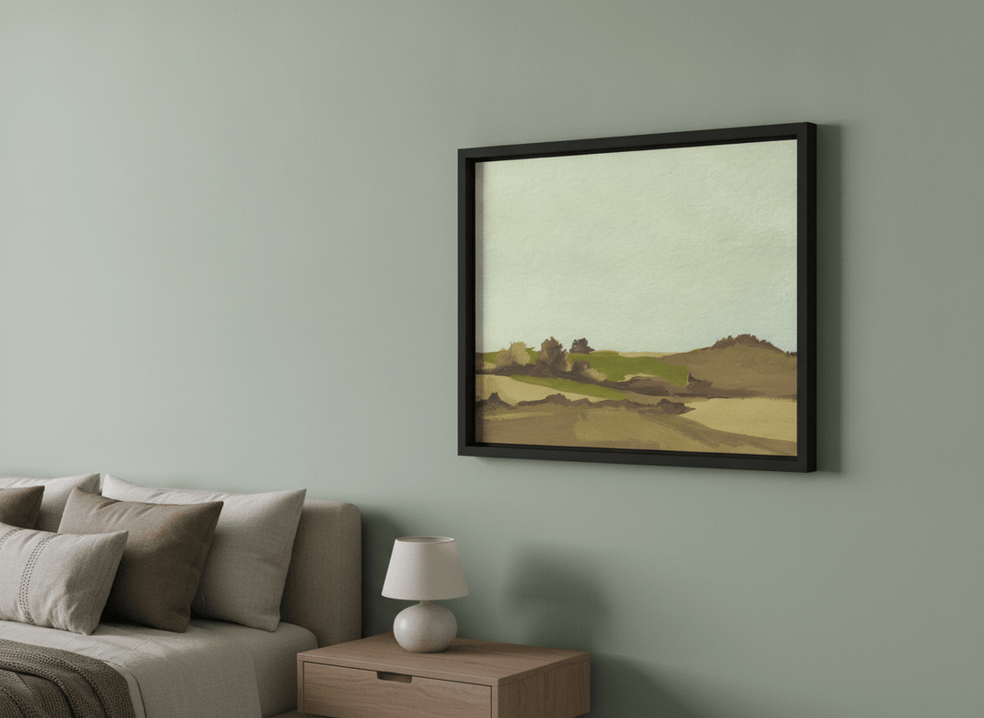 Minimalist artwork displayed in a calm, light-filled bedroom interior