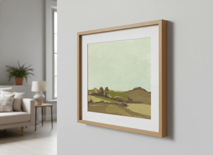 Modern wall art styled above a sofa in a neutral living room