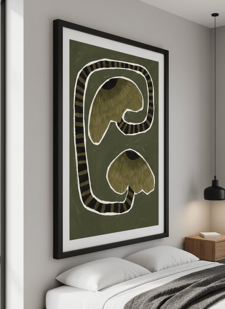 Minimalist artwork displayed in a calm, light-filled bedroom interior