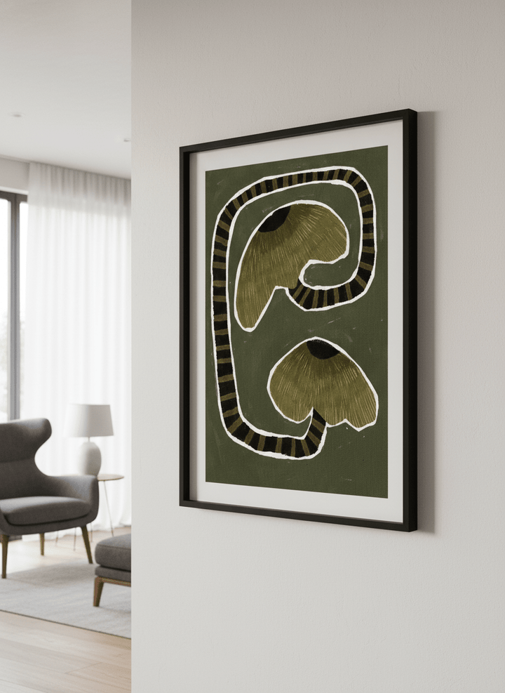Modern wall art styled above a sofa in a neutral living room