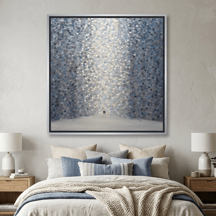 Canvas wall art with a silver leaf surround styled in a calm, light-filled bedroom