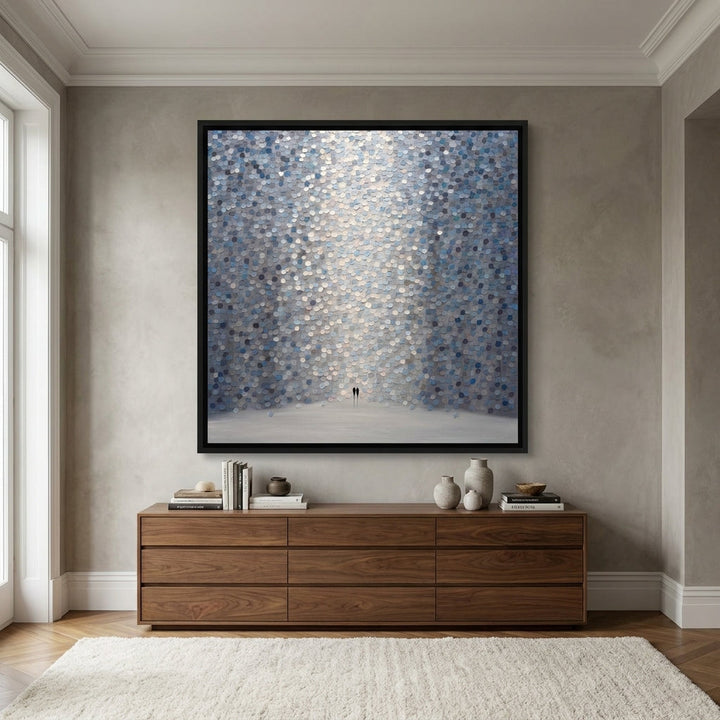 Oversized statement canvas wall art with a black surround styled in a luxe interior