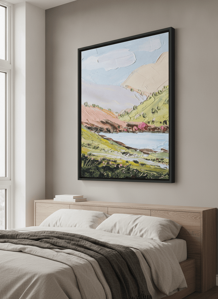 Minimalist artwork displayed in a calm, light-filled bedroom interior