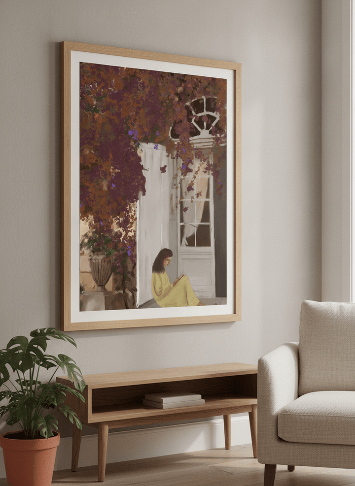 Modern wall art styled above a sofa in a neutral living room