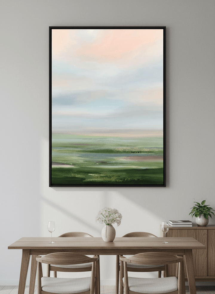 Wall art styled above a dining table in a contemporary home