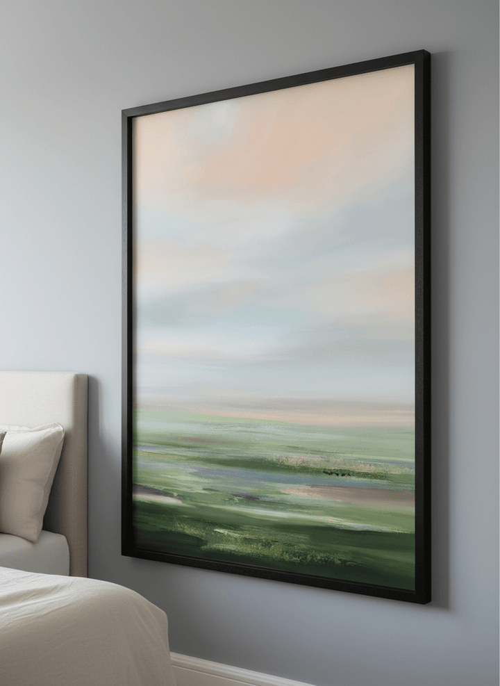 Minimalist artwork displayed in a calm, light-filled bedroom interior