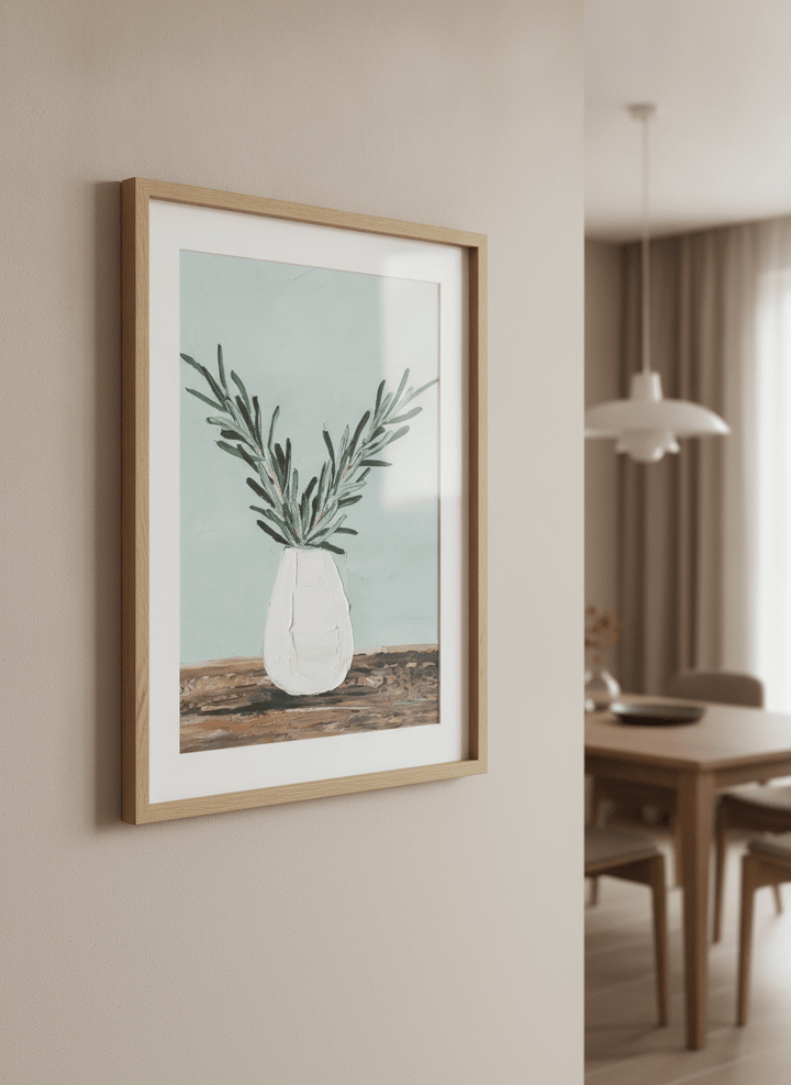 Wall art styled above a dining table in a contemporary home