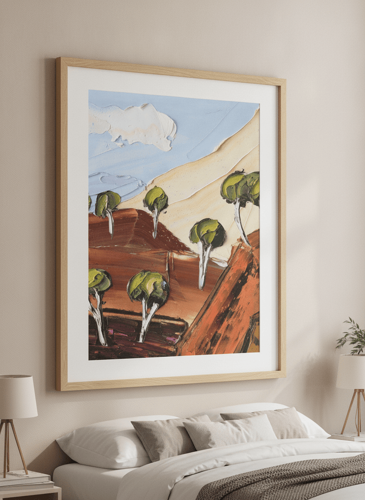 Minimalist artwork displayed in a calm, light-filled bedroom interior
