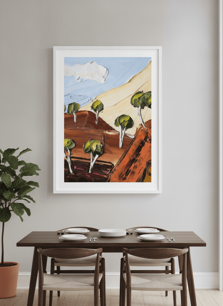 Wall art styled above a dining table in a contemporary home