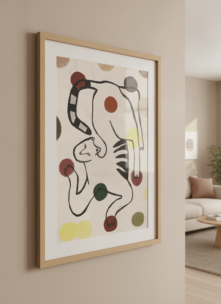 Modern wall art styled above a sofa in a neutral living room