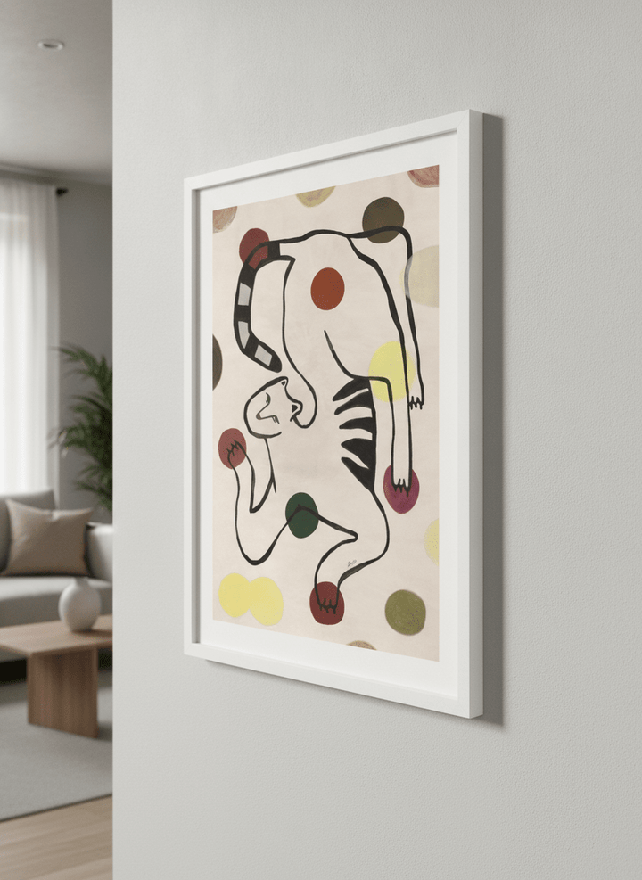 Modern wall art styled above a sofa in a neutral living room