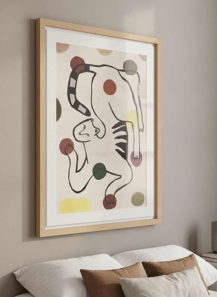Minimalist artwork displayed in a calm, light-filled bedroom interior