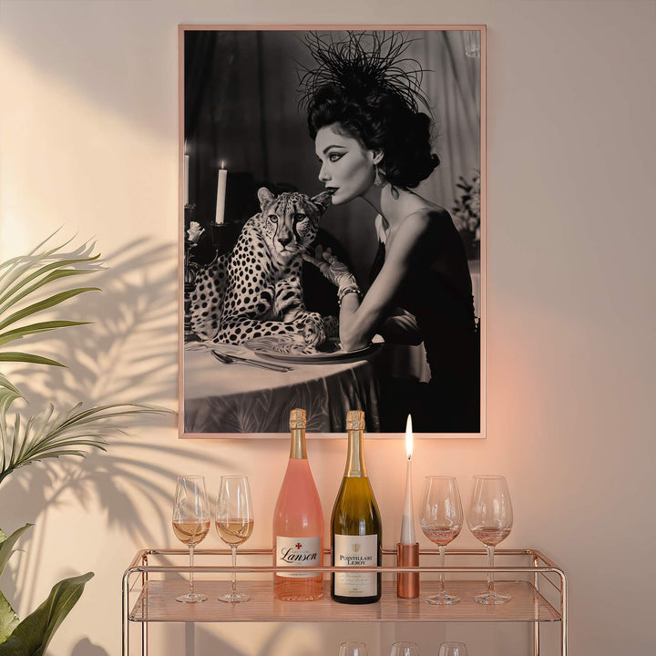 artwork of a woman with a leopard on a table, with a bar setup below featuring champagne bottles and glasses.