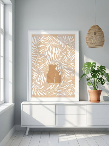 Modern wall art print standing on a sideboard in a bright Scandinavian bathroom