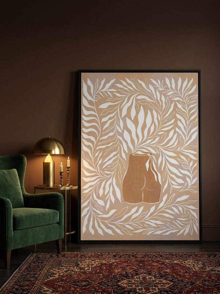 Oversized statement canvas wall art with a black surround leaning against the wall in a moody dining room