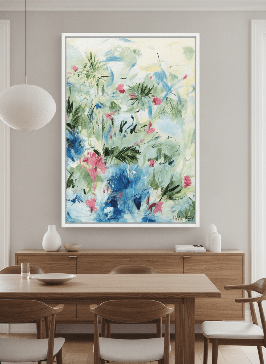 Wall art styled above a dining table in a contemporary home