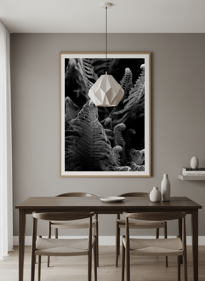 Wall art styled above a dining table in a contemporary home