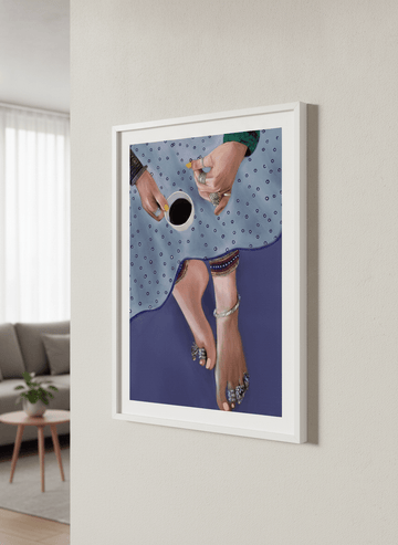 Modern wall art styled above a sofa in a neutral living room
