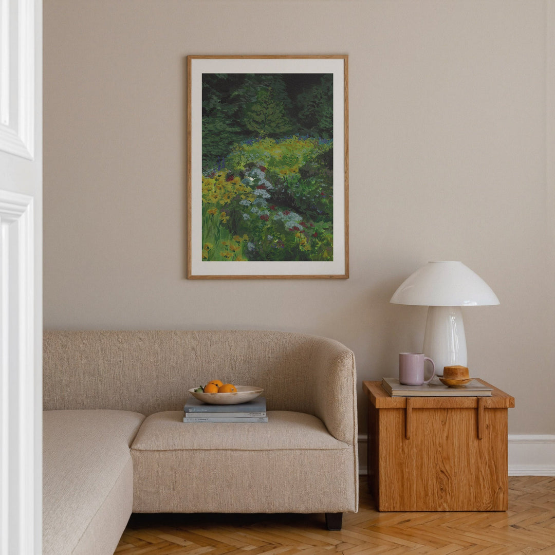 Living room with beige sofa, wooden side table, and artwork on the wall.