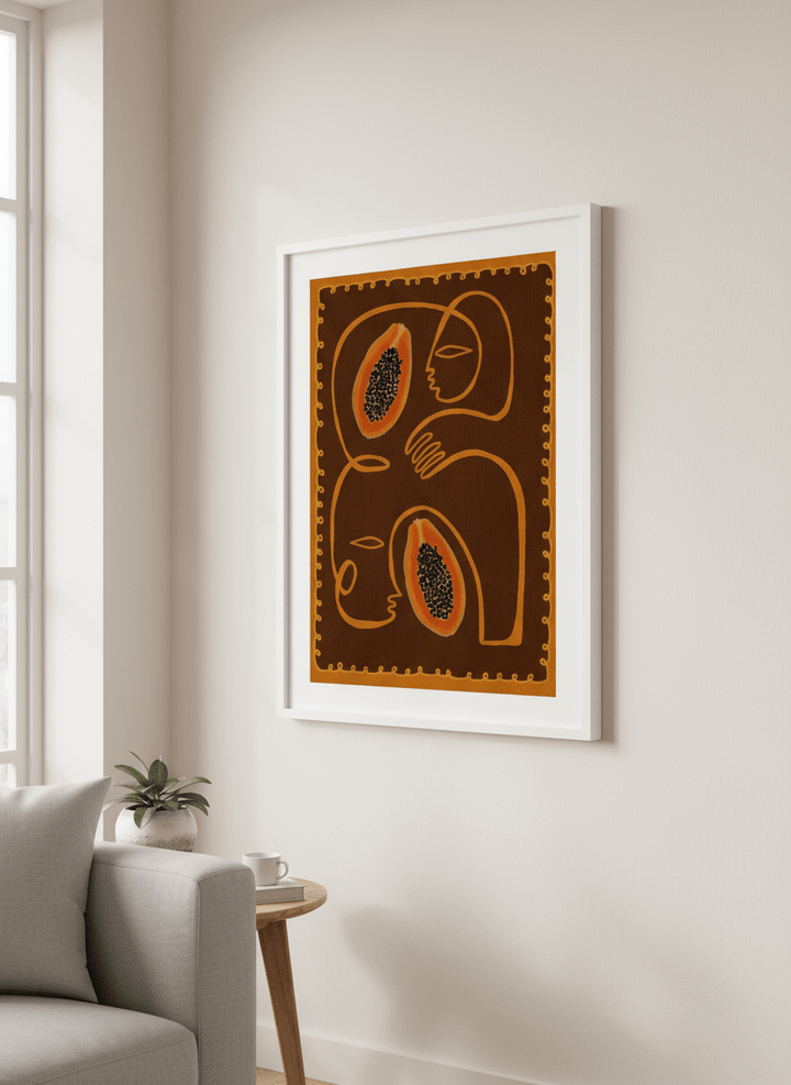 Modern wall art styled above a sofa in a neutral living room