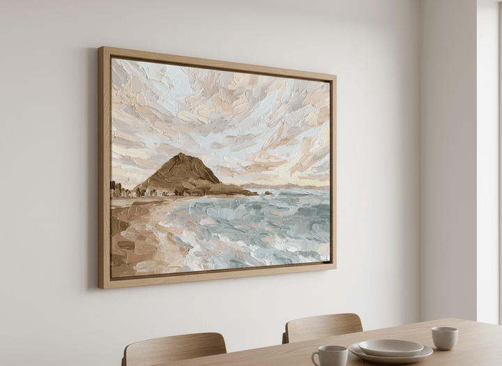 Wall art styled above a dining table in a contemporary home